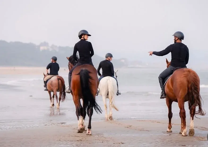 Club riders by the sea in Deauville